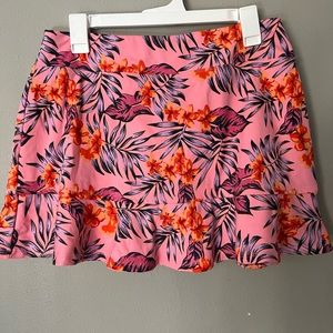 Tommy Bahama golf skort size Large, floral pink, never been worn.